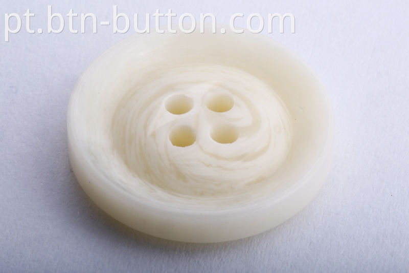 Imitation horn resin button with logo